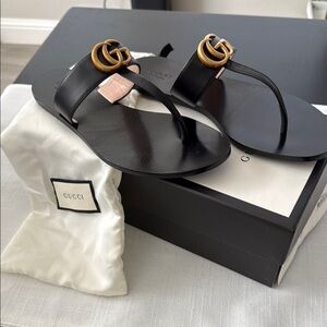 Gucci Black Sandals with Gold Accents